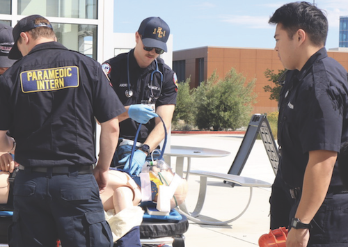 Medic students with a manikin