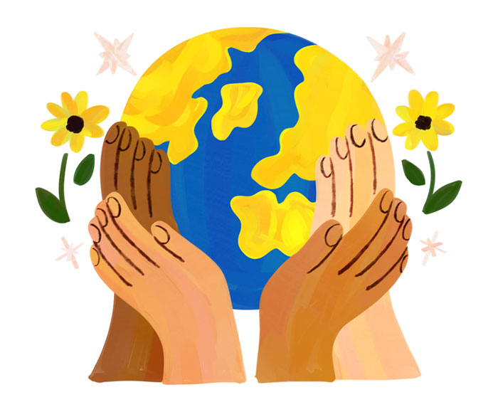 Hands holding earth with flowers